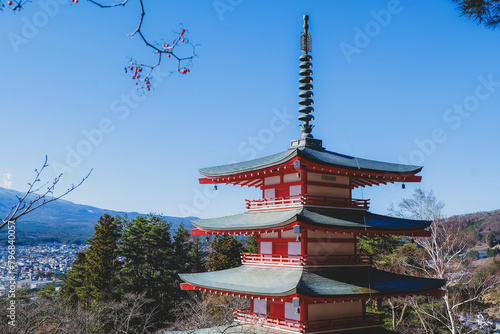 The iconic view of Mount Fuji with the red Chureito pagoda and Fujiyoshida city from Arakurayama sengen park in Yamanashi Prefecture  Japan.