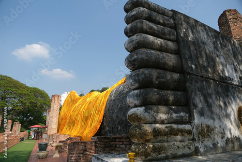 The big feet of Phra Si Mueang Thong, the reclining Buddha image of Wat Khun Inthapramun for pray of healthy. © Warida.lnnl