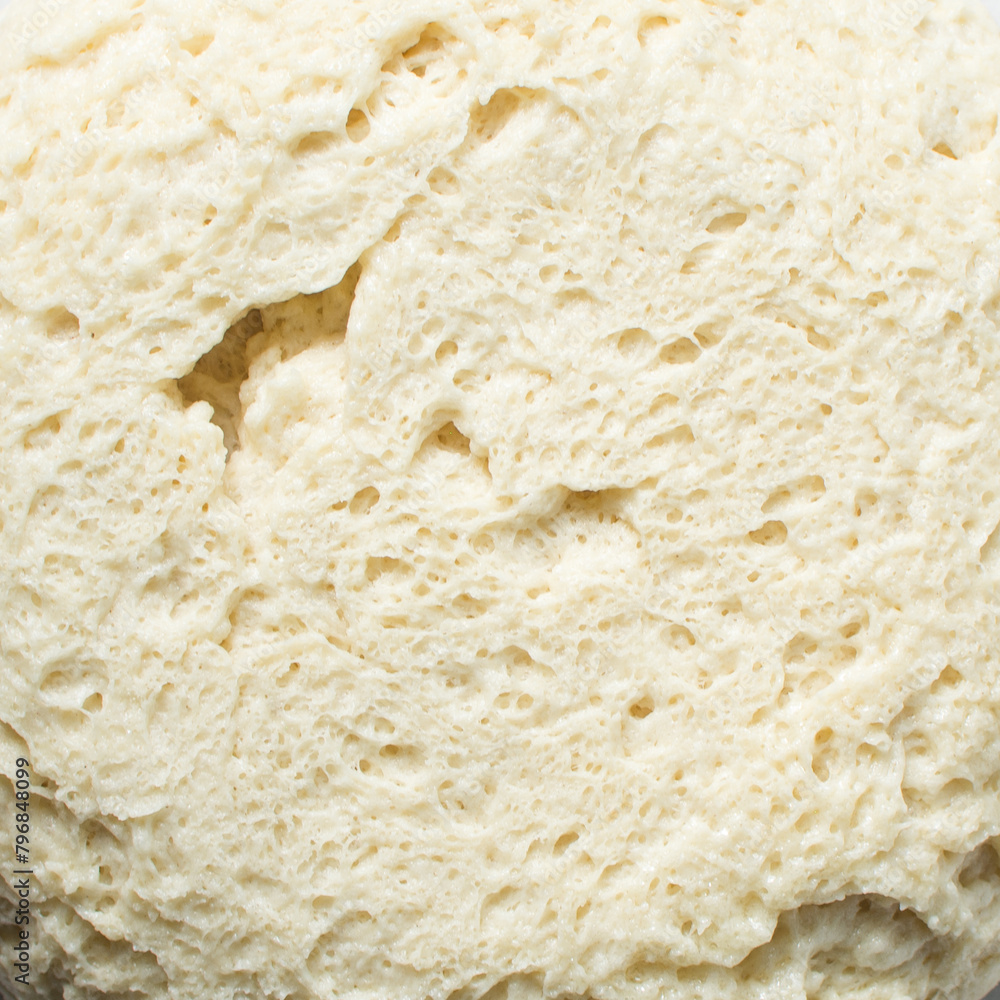 overhead view of Bread dough that has doubled in size, dough that has risen, proofed dough that has risen overhead view of Bread dough that has doubled in size, dough that has risen, proofed dough that has risen