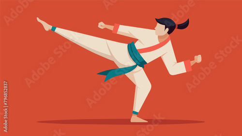 A practitioner balances on one foot while reaching for their toes demonstrating the importance of balance and flexibility in martial arts.