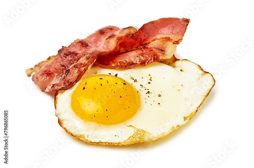 Food fried egg and bacon on white background, delicious cuisine