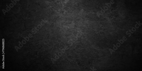 Black stone wall texture grunge rock surface. dark gray concrete background backdrop. wide panoramic banner. old wall stone for dark black distressed grunge background wallpaper rough concrete wall.