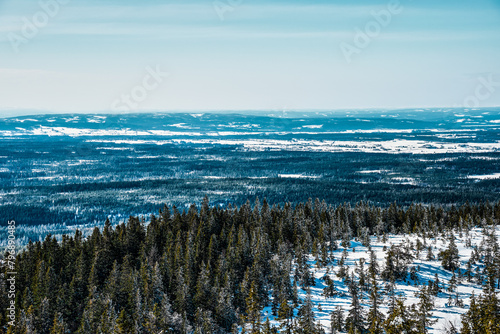 View westward from the Tjuvaaskampen Hill, part of the Totenaasen Hills, Norway, a winter day in March. photo