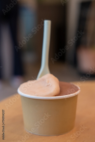 A cup of Gelato, Ice-cream on the table with blur background in a shop