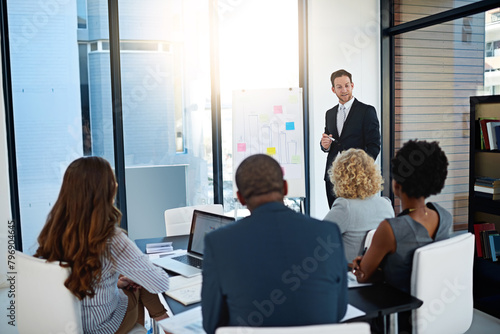 Board  businessman or speaker in presentation for teaching  advice or skill development in meeting. Group  workshop or leader talking in pitch  training or coaching for learning opportunity or ideas