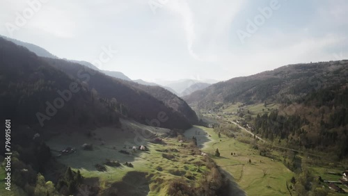 Aerial video on green mountains in Valea Doftanei Romania photo