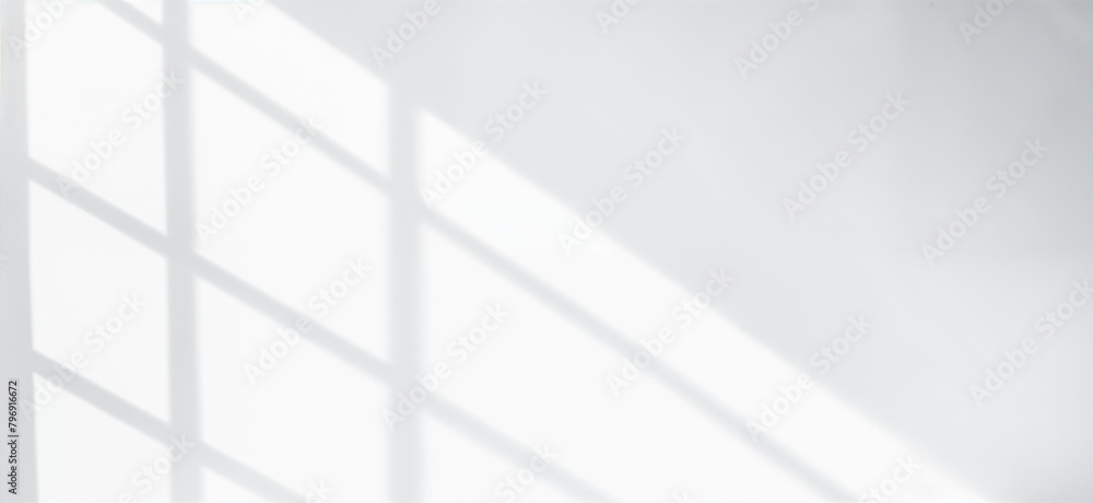 Soft Window Light and Shadow Overlay on a White Wall Creating Abstract Pattern. High-Key Image of Soft Shadows and Light on White Wall Creating Minimalist Composition Soft Window Light and Shadow Overlay on a White Wall Creating Abstract Pattern. High-Key Image of Soft Shadows and Light on White Wall Creating Minimalist Composition