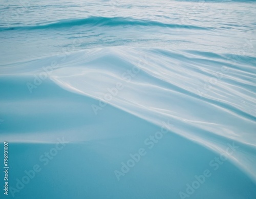 Abstract blue background with smooth lines and a wave pattern design.