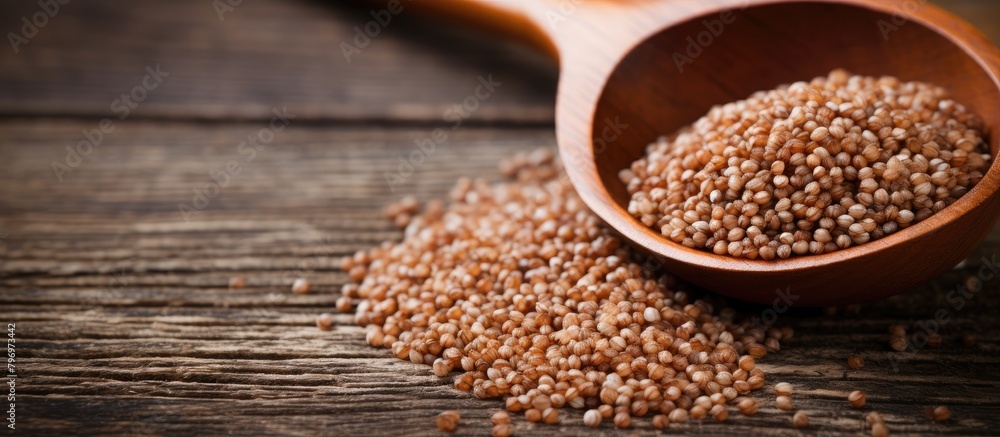 Wooden spoon with grains on table Wooden spoon with grains on table