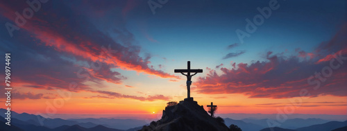 Silhouettes of crucifix symbols perched atop mountain ridges, contrasting with the hues of the vibrant sky. photo