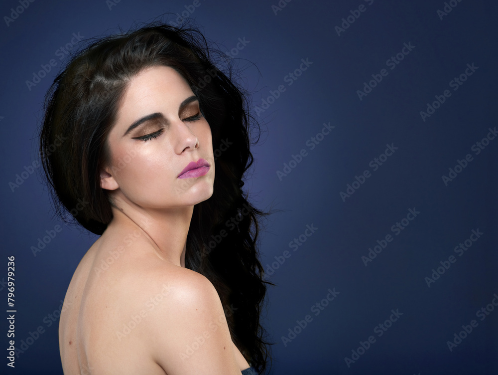 Beauty, woman and makeup with skincare, glow and dermatology on blue studio background. Person, girl and model with shine, wellness and luxury with cosmetics, grooming and healthy skin with aesthetic Beauty, woman and makeup with skincare, glow and dermatology on blue studio background. Person, girl and model with shine, wellness and luxury with cosmetics, grooming and healthy skin with aesthetic