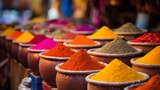 Colorful assortment of spices displayed in an Indian market, highlighting vibrant culture and diversity