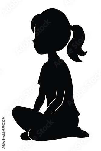 black silhouette of a girl sitting on the floor