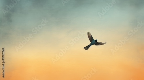 Graceful bird flying over tranquil waters with a soft, colorful sunset background