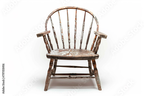 A weathered and worn-out Windsor chair highlighted on a solid white background, isolated on solid white background.