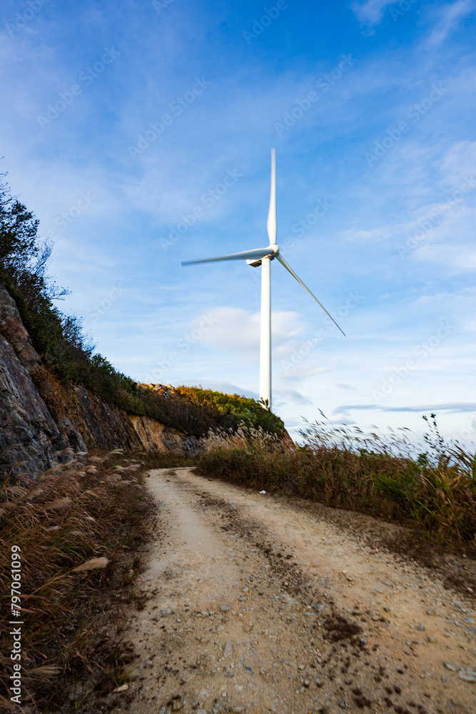 Windmill on a sunny autumn day in Queya Mountain, Dongyuan County, Heyuan County, Guangdong, China Windmill on a sunny autumn day in Queya Mountain, Dongyuan County, Heyuan County, Guangdong, China