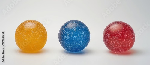 Three Different colored jelly balls in a Row photo