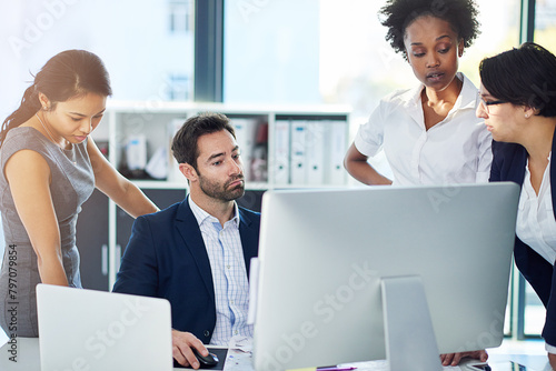 Laptop, group and employee in office, disappointed and feedback for project in email, fail and ideas. Collaboration, man and women in corporate, meeting and unhappy with results and copywriting