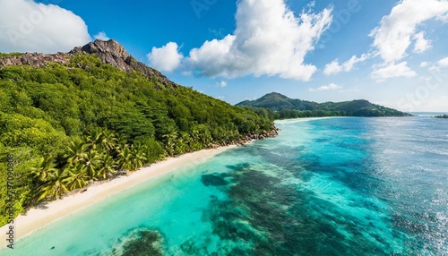 aerial view of la digue beach a beautiful tropical beach along the coastline in la digue and inner islands seychelles