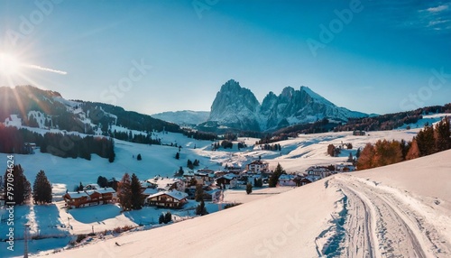 panoramic morning view of alpe di siusi village majestic winter sunrise in dolomite alps superb landscape of ski resort ityaly europe beauty of nature concept background