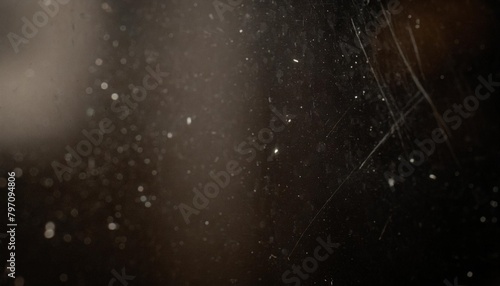 scratches and white dust on a dark background the appearance of grime on glass