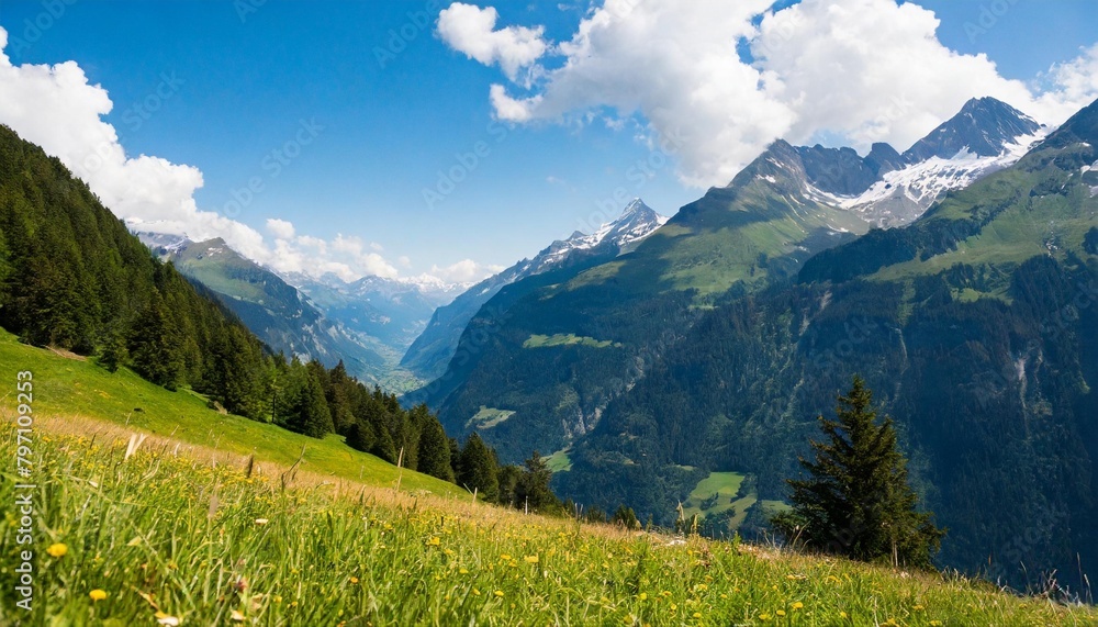 idyllic landscape in the alps tree grass and mountains switzerland