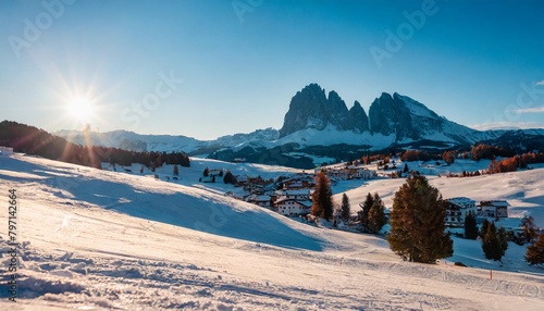 panoramic morning view of alpe di siusi village majestic winter sunrise in dolomite alps superb landscape of ski resort ityaly europe beauty of nature concept background