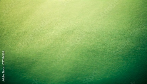 pastel green background paper in texture border design of soft blank solid yellow green background with light center and dark borders elegant christmas color with faint distressed vintage texture © Deven