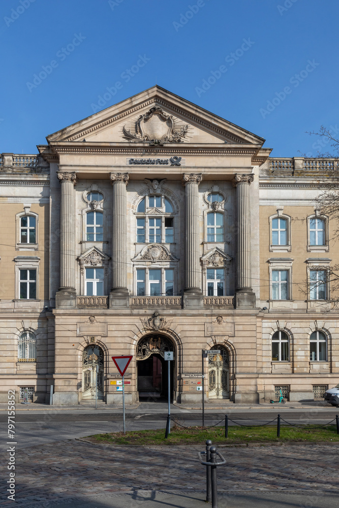 Obraz premium Deutsche Post building with signage and logo on historic facade