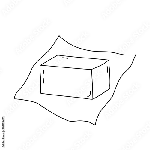 Block of butter or margarine on a piece of wrapping paper, doodle vector outline for coloring book