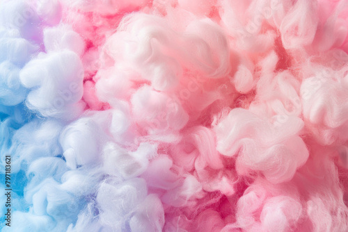 Fluffy and pastel-colored texture of cotton candy  capturing its sugary sweetness and airy quality. Cotton candy textures offer a whimsical and playful backdrop.