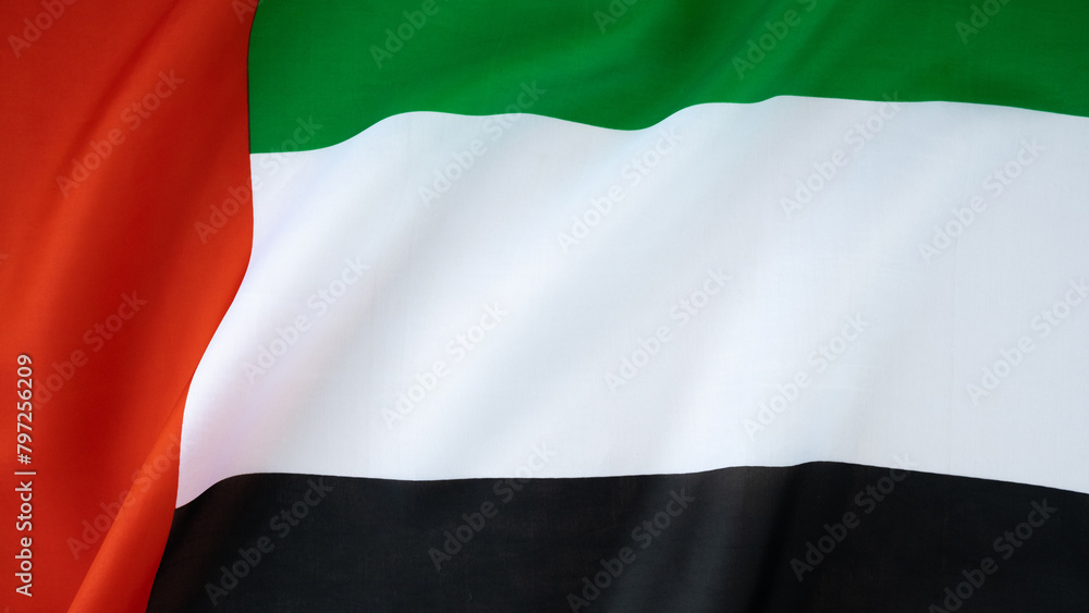 Obraz premium National symbol of UAE. United Arab Emirates flag background. Copy space for your text. Concept of National day Independence 