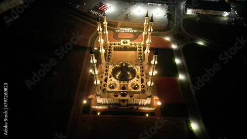 shooting a mosque from a drone at night. photo