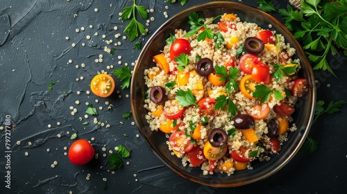 Freshly prepared top view of Mediterranean quinoa salad, highlighting colorful ingredients like olives and tomatoes, studio lighting enhances the natural appeal, isolated background