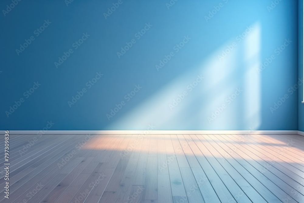 a room with a blue wall and wood floor