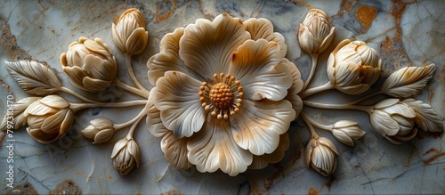 Intricate flower motif carved into a smooth marble wall, adding an elegant touch to the architectural design