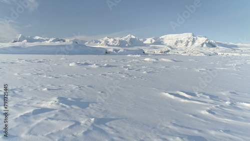 Snow Covered Antarctic Surface Aerial View Flight. South Pole Ice Landscape. Winter Frozen Ground Continent Snowy Frost Rock Epic Drone Fly