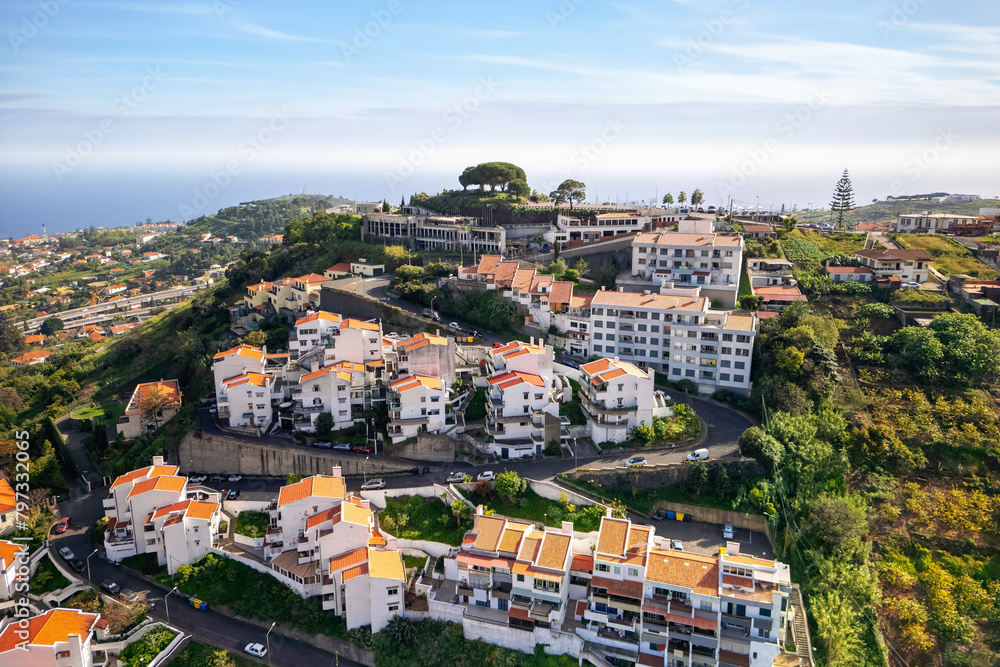Aerial view of Modern villa homes on the hill top in Funchal city, Madeira Island.