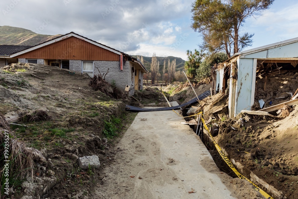 Silt and house buried and damaged in the Cyclone Gabrielle natural disaster. Eskdale, Napier, Hawkes Bay, New Zealand Bay. February 2023