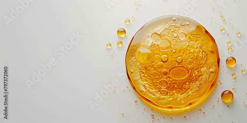 golden yellow round drop of oil with molecules on white background, Golden yellow abstract oil drops