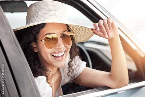 Portrait, smile and woman by car window in sunglasses for travel, vacation or excited tourist on summer adventure. Face, hat and happy girl in transportation for road trip, journey or drive in Mexico © peopleimages.com