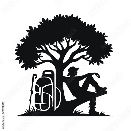 silhouette of a hiker resting under a tree with a backpack beside them