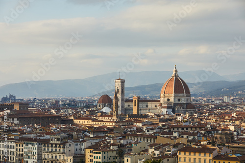 Iconic Florence skyline at sunset over Arno River photo