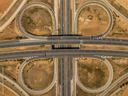 Aerial view of the intersection between the A-4 and A-43 highways near Manzanares, in the La Mancha region (Ciudad Real, Castilla La Mancha, Spain) photo