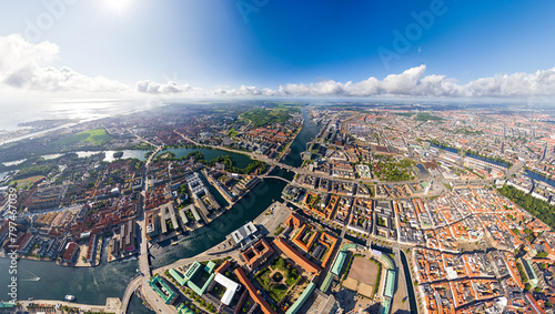 Copenhagen, Denmark. Panorama of the city in summer. Sunny weather with clouds. Aerial view photo