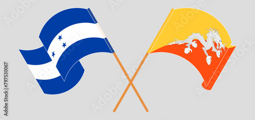 Crossed and waving flags of Honduras and Bhutan