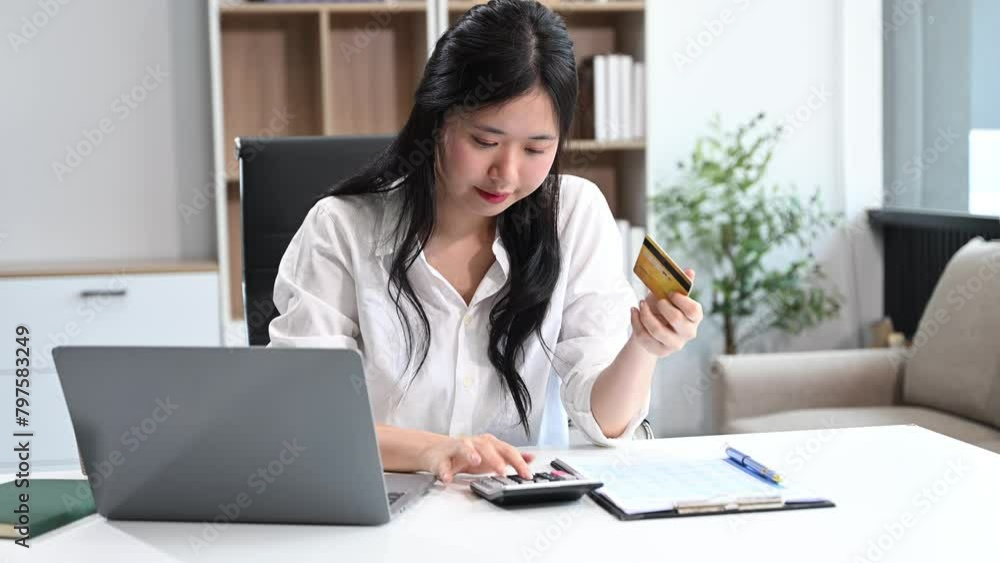 Financial owe, hand of woman sitting, holding credit card, stressed by calculate expense from invoice or bill, no money to pay, mortgage or loan. Debt, bankruptcy Financial owe, hand of woman sitting, holding credit card, stressed by calculate expense from invoice or bill, no money to pay, mortgage or loan. Debt, bankruptcy