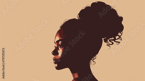 Silhouette of Black woman with curly hair in a bun.