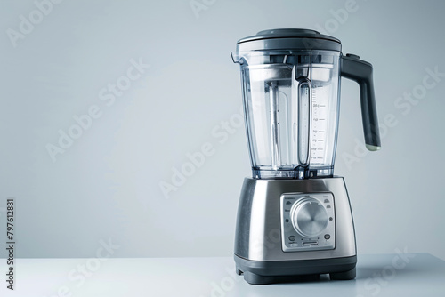 A blender with a stainless steel blade and a smoothie preset button isolated on a solid white background.