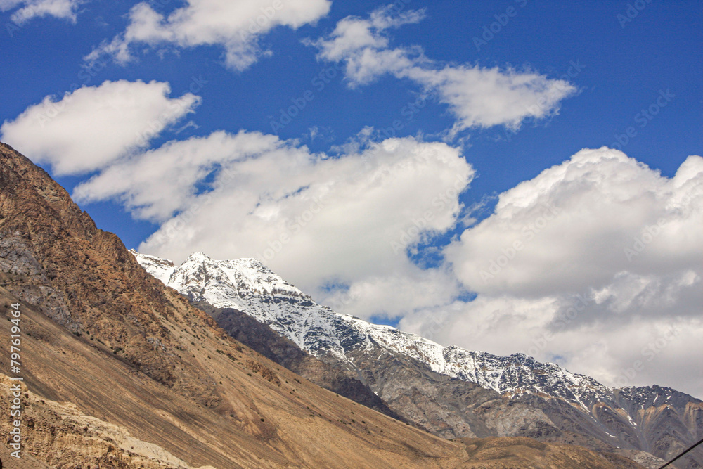 Snow-covered mountains and clouds, Hunza Nagar